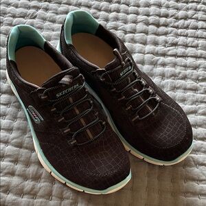 Skechers women’s Black and Teal Sneakers